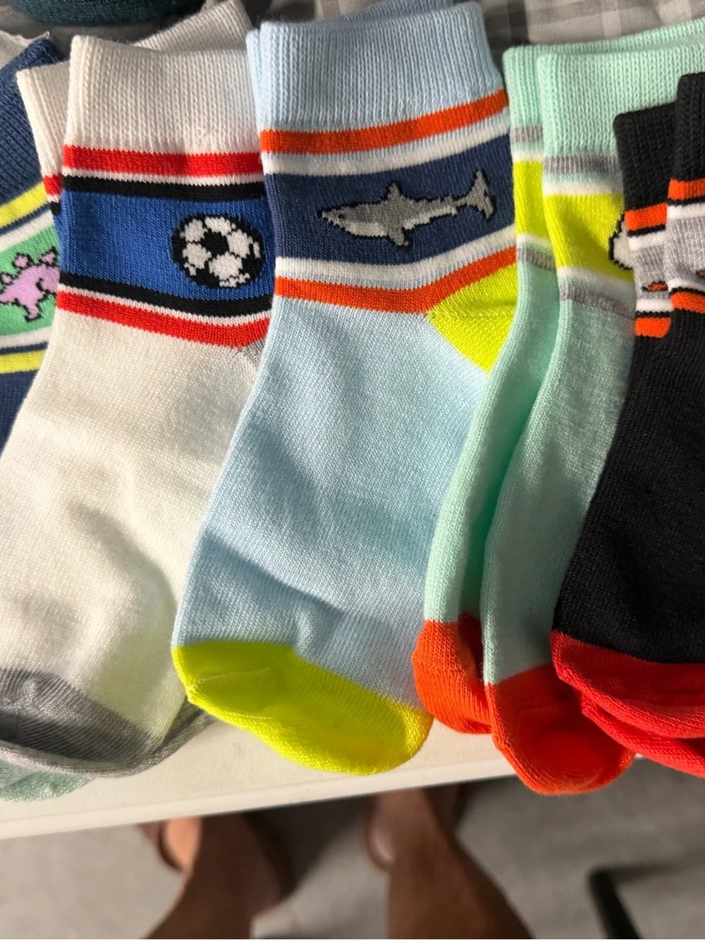 Five pair of boys socks, unbranded open package 6 inches from toe to heel